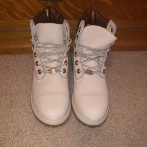 Rose gold and tanish white timberlands